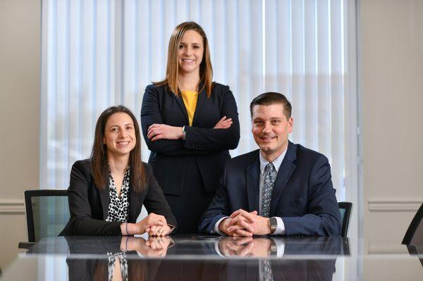 Rebecca Sheppard, Kaitlyn Loughner and Peter Haukebo, tax attorneys at Frost & Associates.