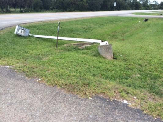 A knocked down light pole to greet you when you pull in. This is the kind of place people speed away from so it's not surprising.