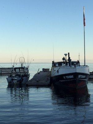 Commercial fishing boat with an angler's boat, during our annual Fishing Tournament, the first Saturday in August.