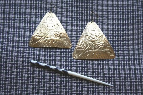 Triangle plate earrings ($6). Chocolate and bone striped hair accessory (2 for $3)