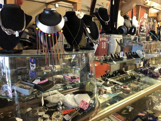 Glass counter with Sterling silver, Gold and costume jewelry. Plus, some amazing crystals!