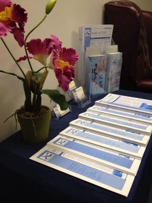 Table of brochures and cards when you walk in and sit down.