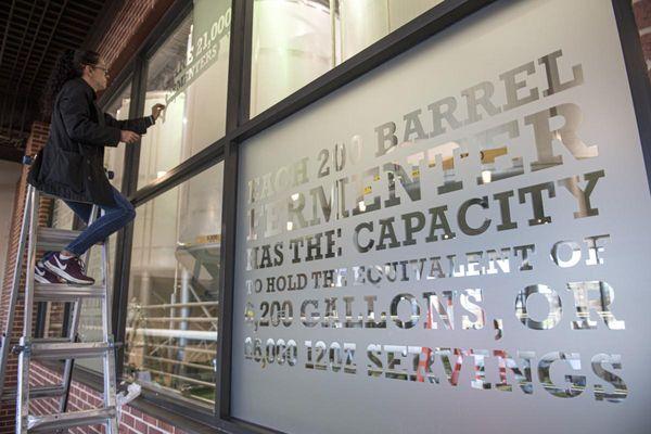 Custom window etch film for Faubourg Brewery, produced and installed by CCI Productions.