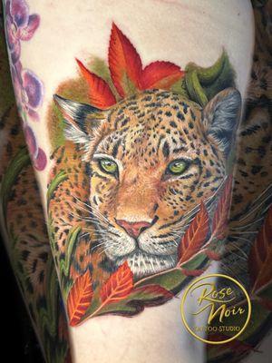 Leopard and foliage by shop owner and tattoo artist Megan Wood!