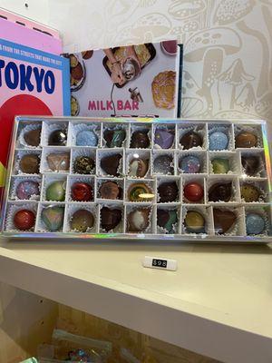 Large box of pretty chocolates (36 for $98!!!). Some pieces look like gems/planets, some are translucent, etc. :)