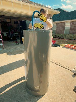 Our team member diligently replaces an HVAC unit, ensuring optimal performance.