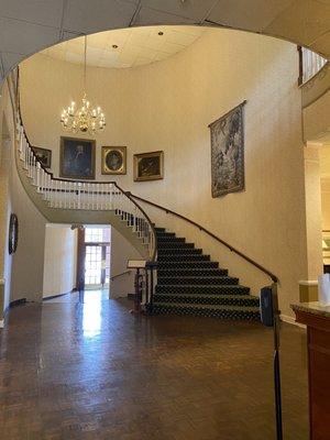 Staircase leading up to breakfast area