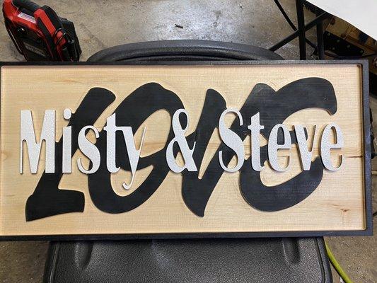 Custom carved wooden and hand painted signs.