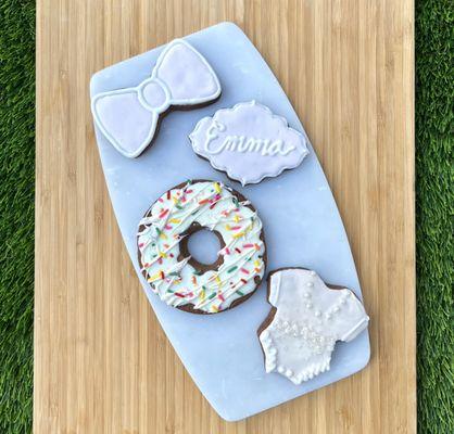 Chocolate sugar cookies decorated with royal icing for baby girl's birthday