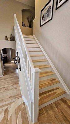 We installed these beautiful hickory wood stairs and floors.