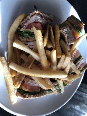 The turkey club sandwich and fries, my choice of side.