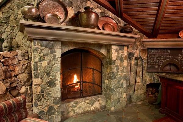 Green Serpentine fireplace for Shadowbrook restaurant in Soquel, CA. Garcia Masonry's renovations include hillside terracing and walkways.