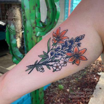 Bundle of wild flowers tattoo by @josefhine_tattoos Swing into Spring with a new bold and bright tattoo! Come by our shop!