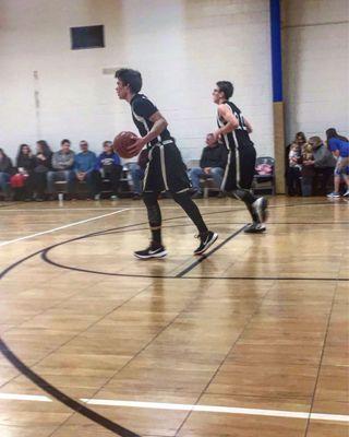 Me and my homie bean at our bball tournament we went off for a combined 69 points