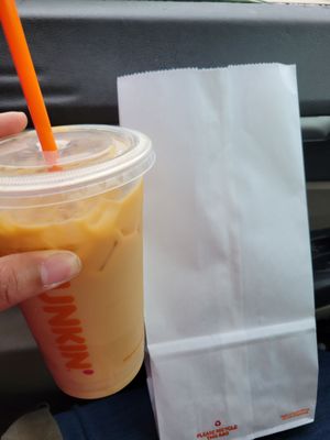 Caramel ice coffee with boston cream donut