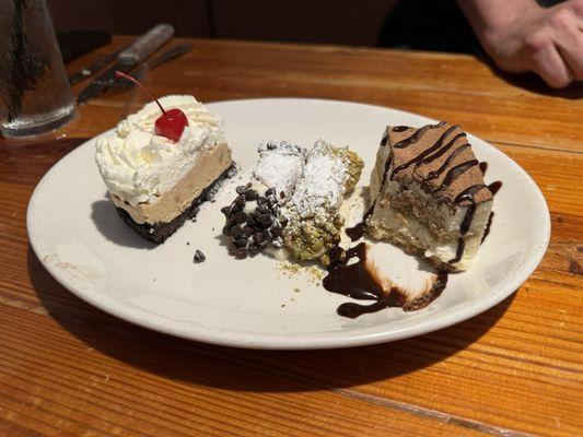 Dessert Trio w/ peanut butter pie, cannoli, and Tiramisu