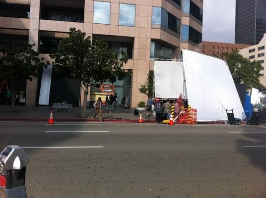 movies taking in front of the building.