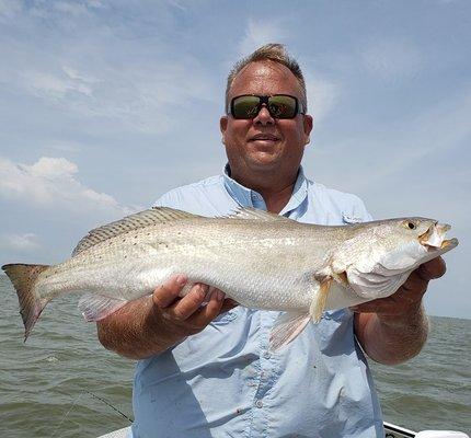 Capt Glenn with a nice East Matagorda Bay trout.