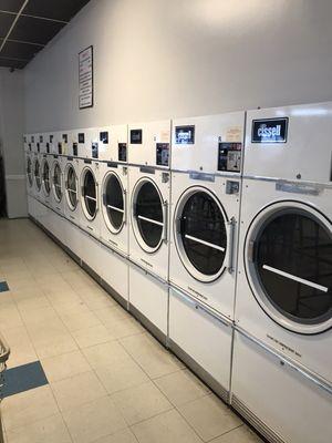 Two wall of dryers for your laundry needs.  Our dryers work great.