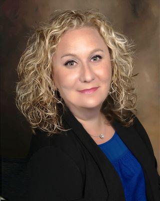 Suzy Stauffer - Coldwell Banker Realty