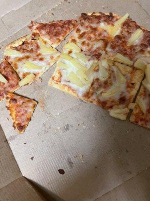 Supposed to be a pizza but as you can see it's all cut up in small pieces instead of slices.