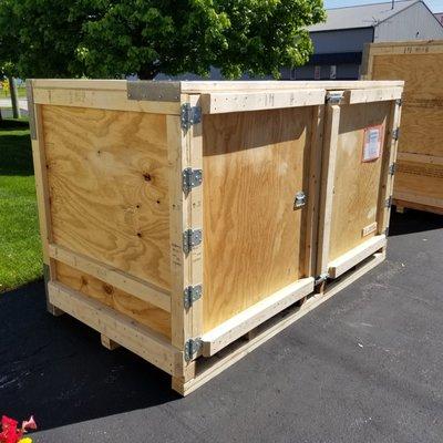 Reusable trade show quality crate with hinged double doors for multiple round trips.