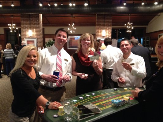 Guest learning to play BlackJacK at a corporate event! (Casino tables provide for Amusement Only-No Real Gambling Allowed Ever!)