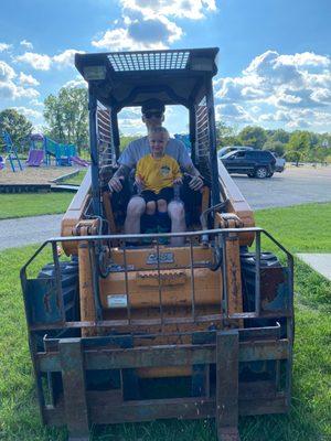 my son and I on skid steer