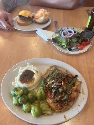 Seasonal Creamy Italian Chicken, mashed potatoes, Brussels sprouts, burger, side salad