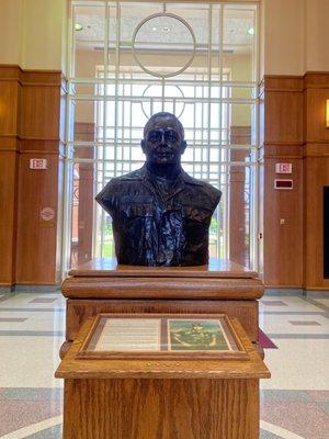 Gen. Alfred M. Gray adorns the corridor between the library/archives and conference center.