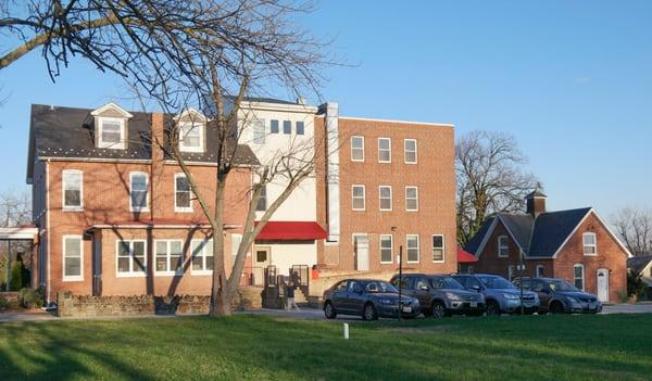 Our school building and carriage house.