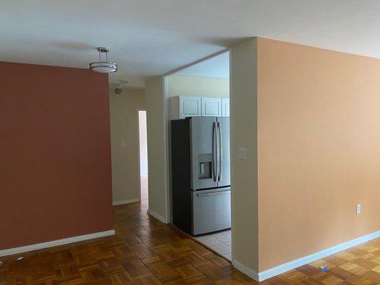 The living room, dining room, kitchen, hallway walls. Ignore the trim since I'll ask them to return after the floor work.