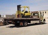 Rogner's Towing flatbed truck