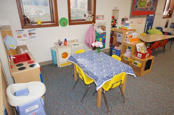 Children enjoy imagining new play scenarios in this dramatic play center at Good Shepherd Lutheran Preschool.