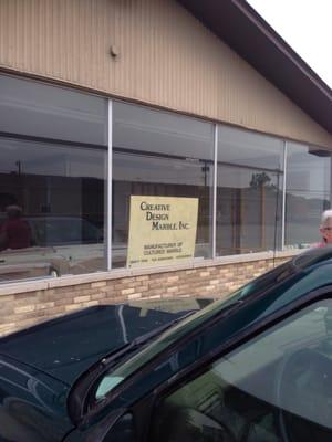 Store front sign in window