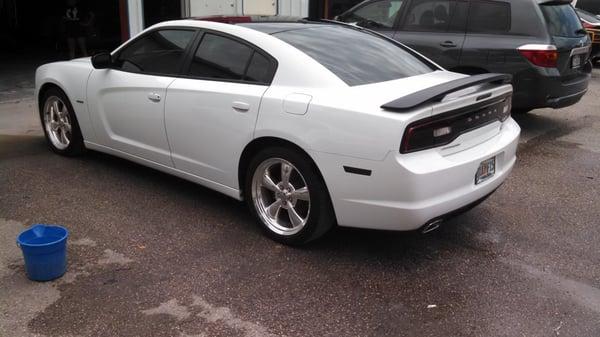 Painted roof carbon gloss black ,smoked out headlamps and tail lights,semi gloss black mirrors and spoiler