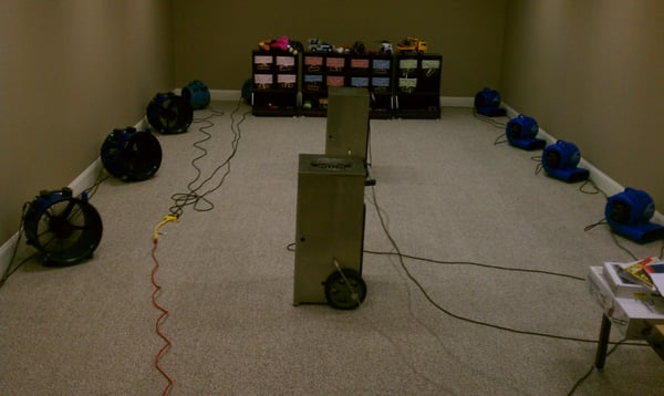 A converted under ground handball court that became a play room.