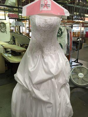 We clean, press and preserve wedding dresses