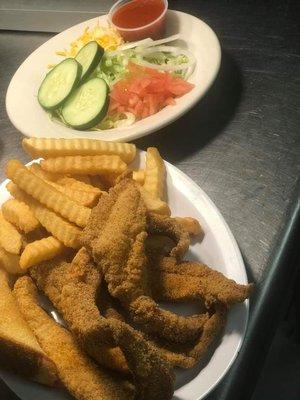 Fried fish,  fries and salad