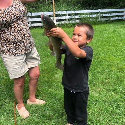 Grandson Ricky with Grandma after catching this monster!