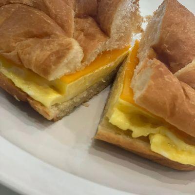 Two egg and cheese sandwich on a croissant