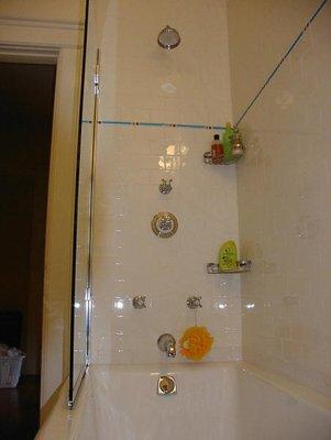 Children's bath and shower with separate controls.