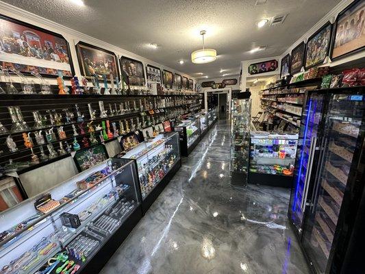 Metallic Epoxy floors and show case cabinets fully stocked stop by today to check
Out the shop