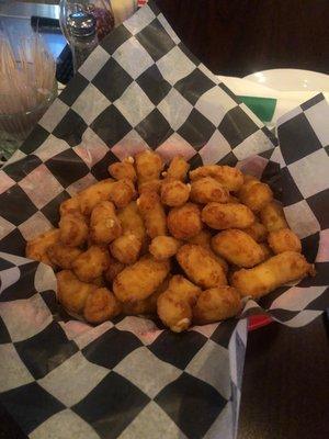 Fried Cheese curds.  Lightly battered and plenty of cheese.