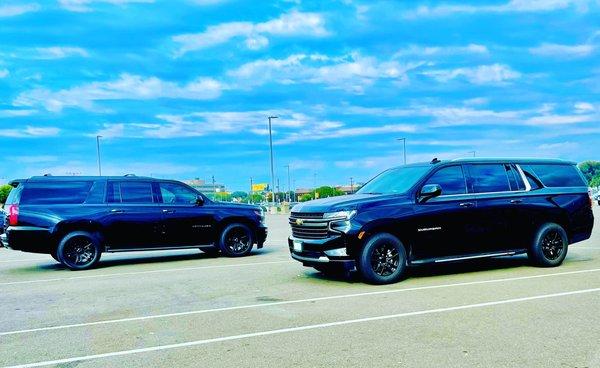 Double black SUV'S