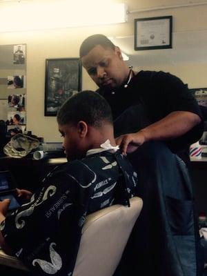 Jay Rich..funny dude...Had me in there Rolling... My son loves his haircut and definitely will be going back...