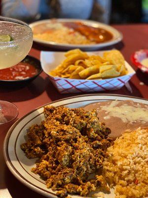 Chorizo with eggs and rice and beans with a cheese enchilada plate and a skinny margarita!