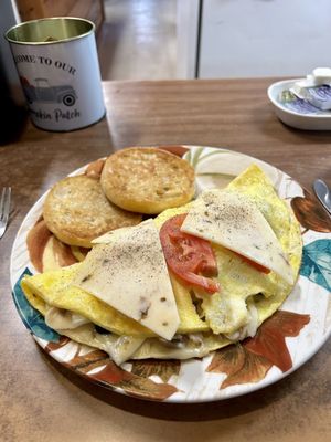 Vege omelet with thin sliced fresh  thinly slice mushrooms and my fav black olives. Grilled English Muffin was Perfectly grilled