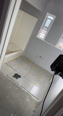 Prepping and tiling small bathroom