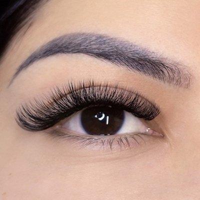 A set of "volume: level 1" eyelash extensions from The Lash Lounge.